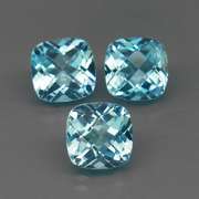 Large 7.73ct vivid blue cushion cut Topaz set