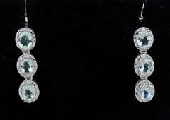 Fashionable Aquamarine & Diamond Dangle Earrings in Sterling Silver