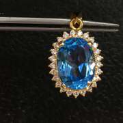 Amazing 24.00 Carat Blue Topaz Pendant, 14kt Gold