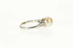 Platinum Retro Pearl Baguette Diamond Engagement Ring