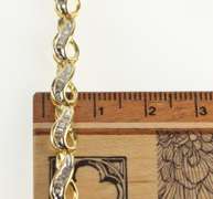 10K Yellow Gold Baguette Diamond Wavy Loop Link Tennis Bracelet