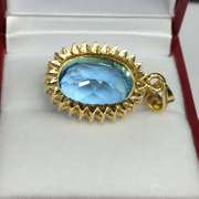 Amazing 24.00 Carat Blue Topaz Pendant, 14kt Gold