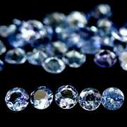 Heavy flashing 6.48ct diamond cut Tanzanite set