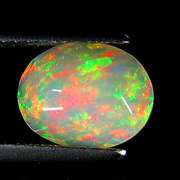 Top fire! 1.25ct smoldering flashing faceted Welo Opal