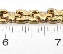 Interesting "X" Bracelet in Yellow Gold