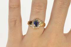 14K Yellow Gold 1.30 Ctw Oval Sapphire Diamond Halo Bypass Ring