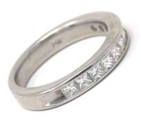 Elegant White Gold Princess Cut Channel Set Band