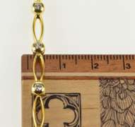 18K Yellow Gold Oval Link Round Diamond Inset Tennis Bracelet