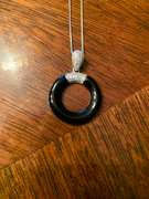 Sterling Silver Black Circle Pendant Necklace with White Gemstones
