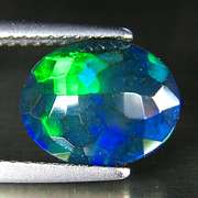 Fully faceted 1.46ct oval cut Black Opal
