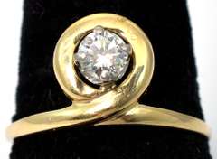 Unique Diamond Solitaire Ring in 14KT