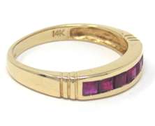 Elegant Yellow Gold Ruby Channel Set Ring