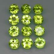 Fantastic 5.04ct 5mm round cut Peridot set