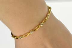 18K Yellow Gold Oval Link Round Diamond Inset Tennis Bracelet