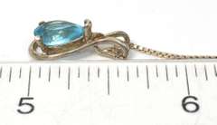 Sterling Silver Necklace With Blue Topaz.