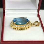 Amazing 24.00 Carat Blue Topaz Pendant, 14kt Gold