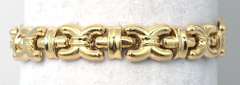 Interesting "X" Bracelet in Yellow Gold
