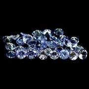 Heavy flashing 6.48ct diamond cut Tanzanite set