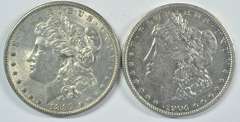 Upper end 1891 & 1904 Morgan Silver Dollars