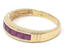 Elegant Yellow Gold Ruby Channel Set Ring