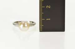 Platinum Retro Pearl Baguette Diamond Engagement Ring