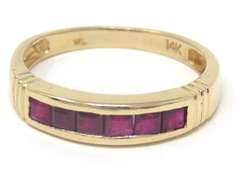 Elegant Yellow Gold Ruby Channel Set Ring