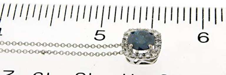 Beautiful 18kt WG Blue Diamond with Diamond Halo Necklace