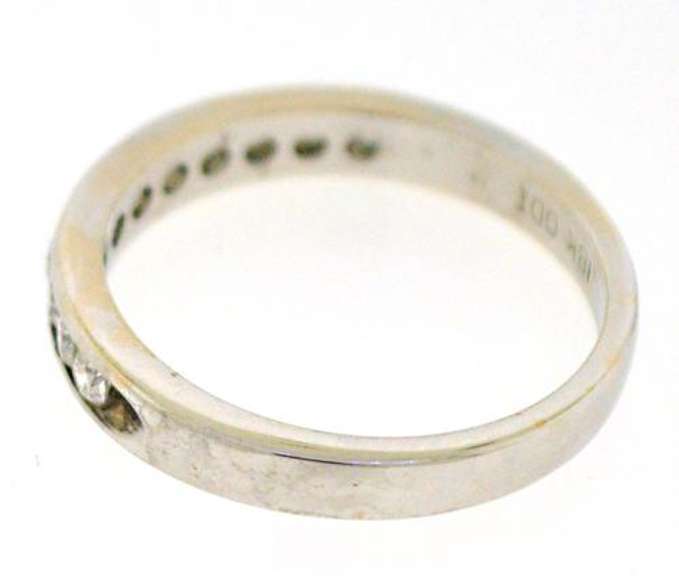 Elegant 18kt Channel Set Diamond Bad Ring