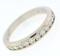 Elegant 18kt Channel Set Diamond Bad Ring