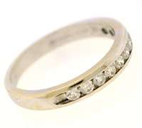 Elegant 18kt Channel Set Diamond Bad Ring