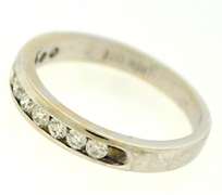 Elegant 18kt Channel Set Diamond Bad Ring