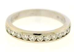 Elegant 18kt Channel Set Diamond Bad Ring