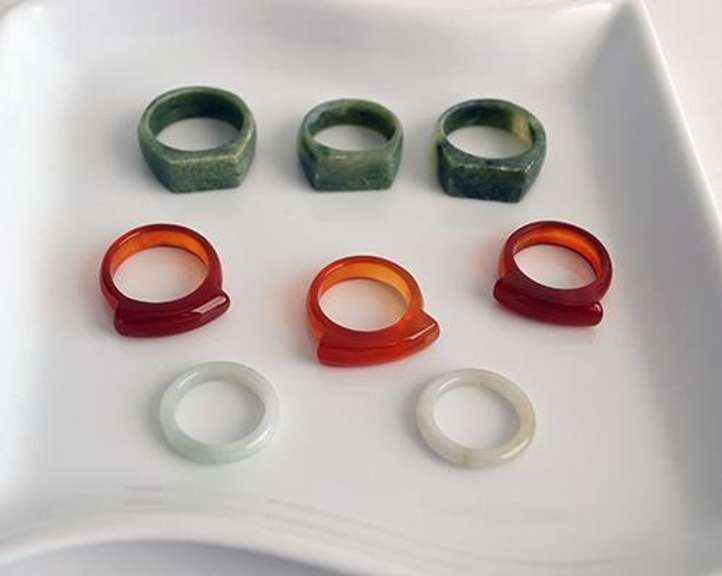 Lot of 8 Carved Jade Rings: Green, Brown and White