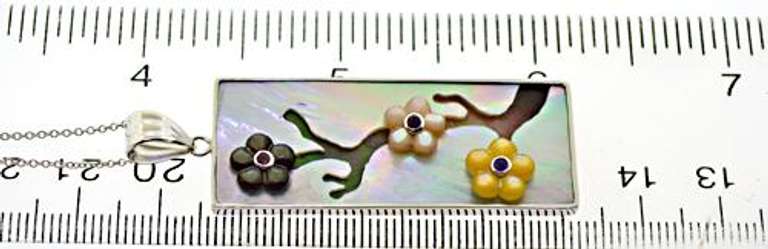 Strong Black and White Mop w Ruby Accent Pendant