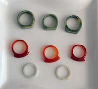 Lot of 8 Carved Jade Rings: Green, Brown and White