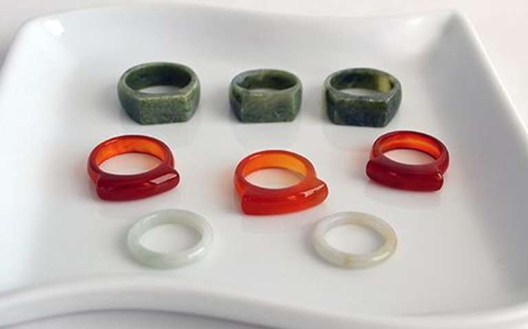 Lot of 8 Carved Jade Rings: Green, Brown and White