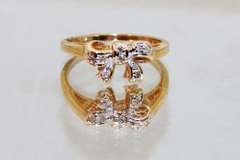 Sweet Bow Ring with Natural Diamonds in 10k