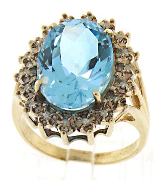 Fantastic Blue Topaz and Diamond Halo Ring