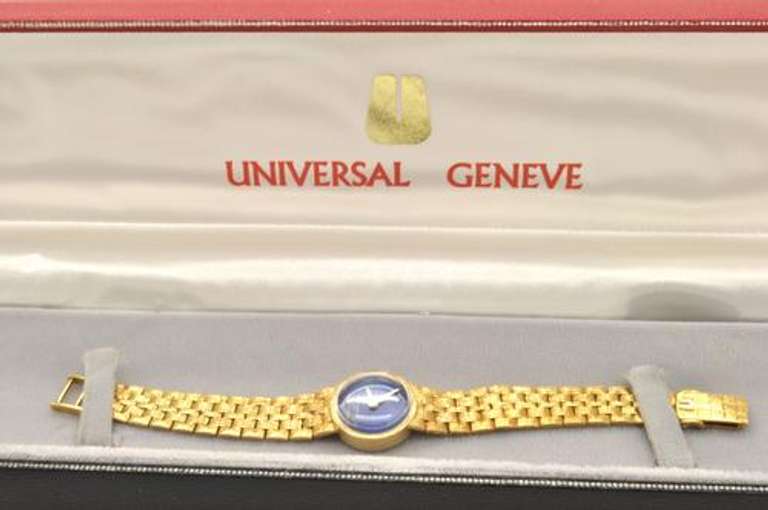 LADIES 18 KT GOLD UNIVERSAL GENEVE WATCH