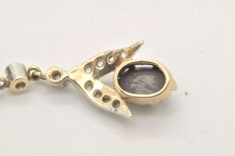 LADIES 18 KT YELLOW AND WHITE GOLD DIAMOND STAR SAPPHIR