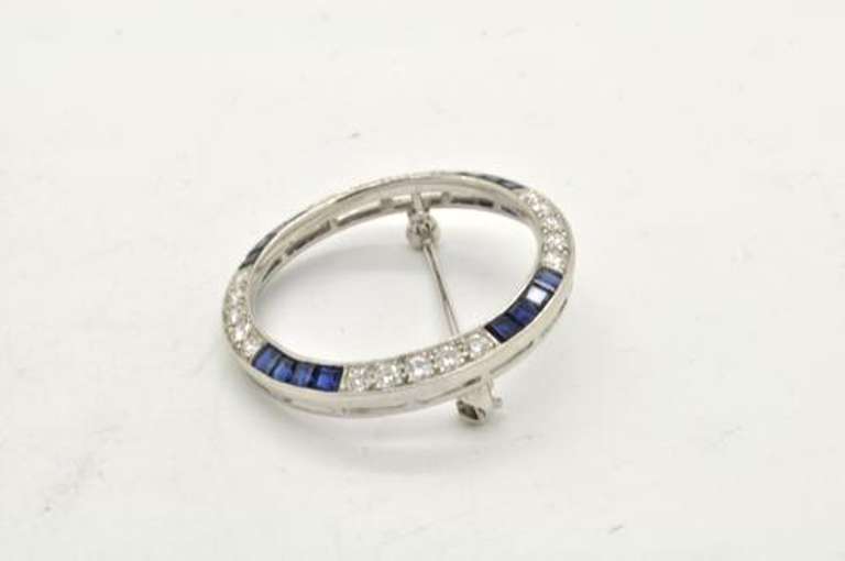ART DECO PLATINUM DIAMOND AND SAPPHIRE BROOCH C. 1920