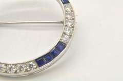 ART DECO PLATINUM DIAMOND AND SAPPHIRE BROOCH C. 1920