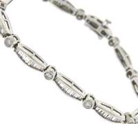 Elegant Baguette & Round Brilliant Cut Diamond Scallop