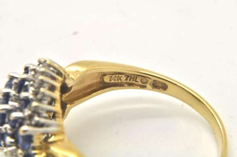 LADIES 14 KT SAPPHIRES AND DIAMOND RING