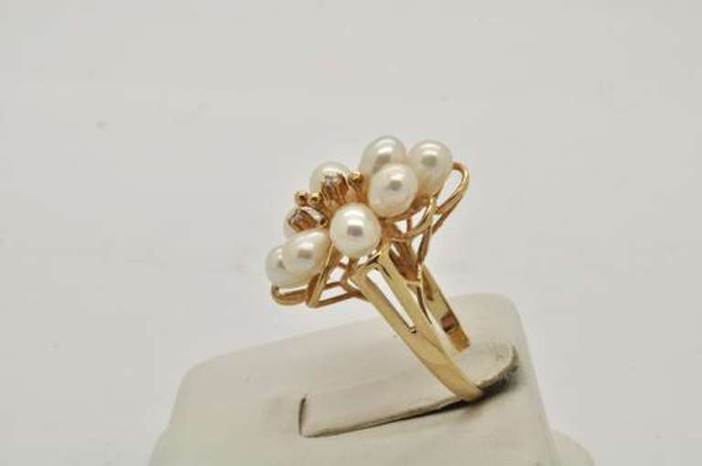 LADIES 14 KT YELLOW PEARL RUBY AND DIAMOND RING.