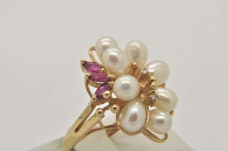 LADIES 14 KT YELLOW PEARL RUBY AND DIAMOND RING.