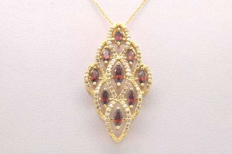 LADIES 14 KT DIAMOND AND GARNETS PENDANT AND CHAIN