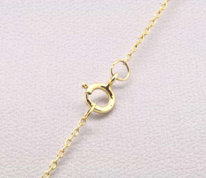 LADIES 14 KT DIAMOND AND GARNETS PENDANT AND CHAIN