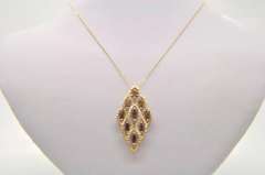 LADIES 14 KT DIAMOND AND GARNETS PENDANT AND CHAIN