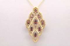 LADIES 14 KT DIAMOND AND GARNETS PENDANT AND CHAIN